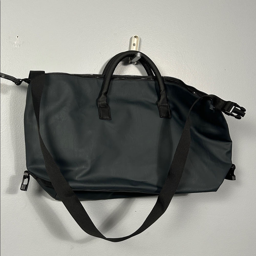 Paco Rabanne parfume dark gray chunky zipper shoulder strap weekender bag